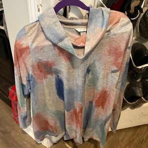 This cowl-neck tunic is. Orange, blue, green and grey. Size 3x